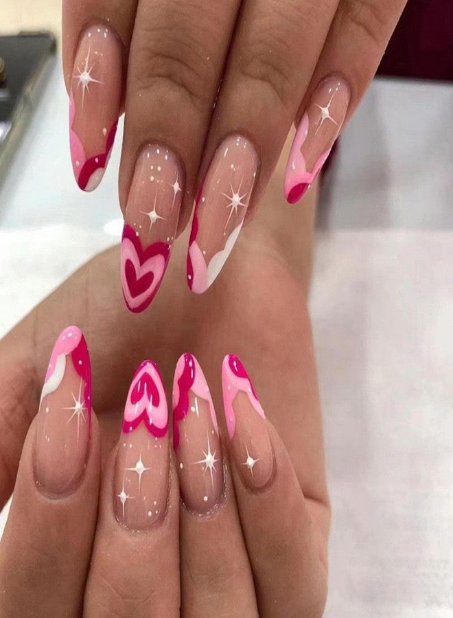 Maigitur Valentine's Day Press on Nails Medium Almond Fake Nails Red Heart False Nails French Tip Glue on Nail Star Pink Love Stick on Nail Glossy Nude Full Cover Acrylic Nail for Women Manicure 24pcs… - Image 1